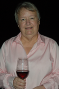 Sara Spayd holding red wine in glass